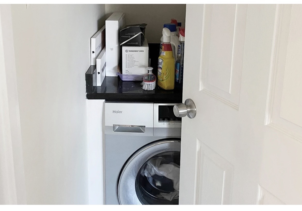 646 West Roscoe Street, Unit 1N Chicago, IL 60657 - Photo 11 of 11 a utility room with dryer and washer