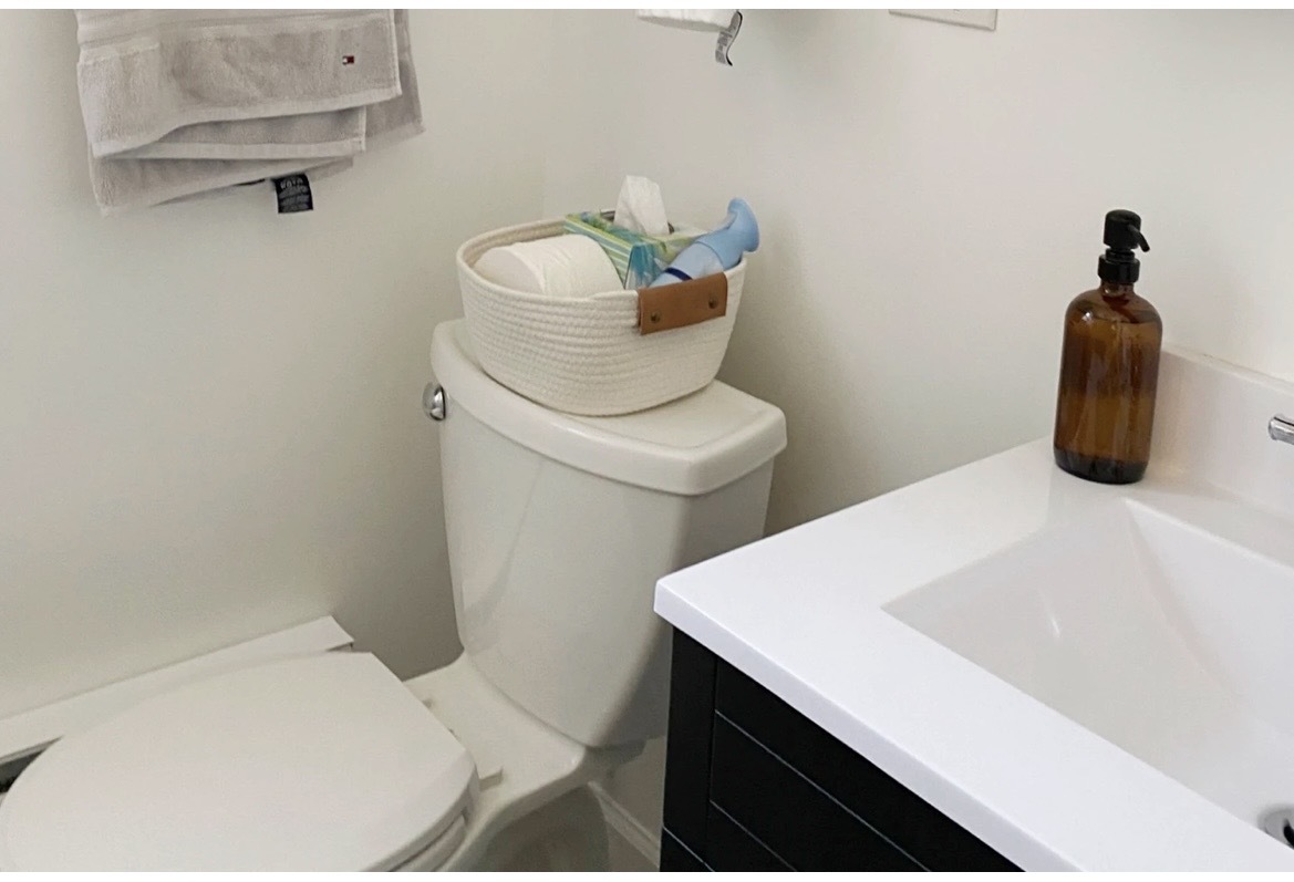 646 West Roscoe Street, Unit 1N Chicago, IL 60657 - Photo 9 of 11 a bathroom with a sink and toilet