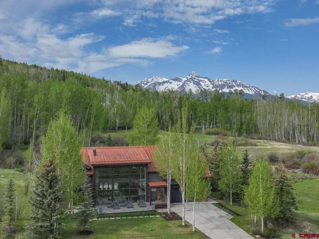 a view of a golf course with a field