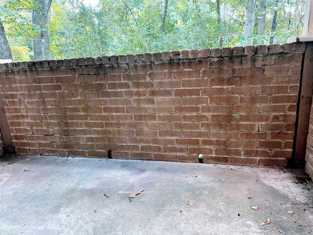 a view of a wooden door and an outdoor space