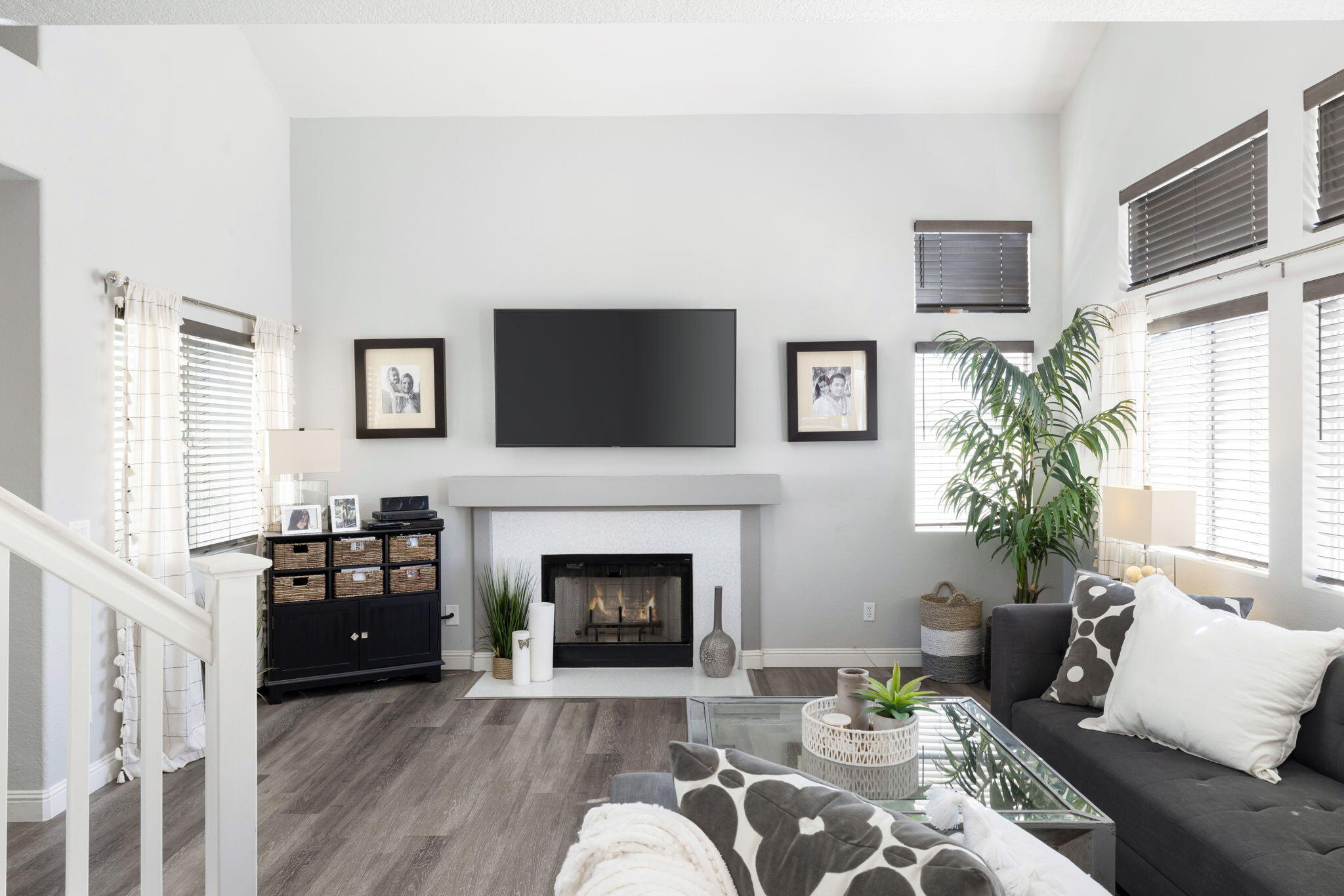 7607 Canberra Way Riverside, CA 92508 - Photo 11 of 28 a living room with furniture a fireplace and a flat screen tv