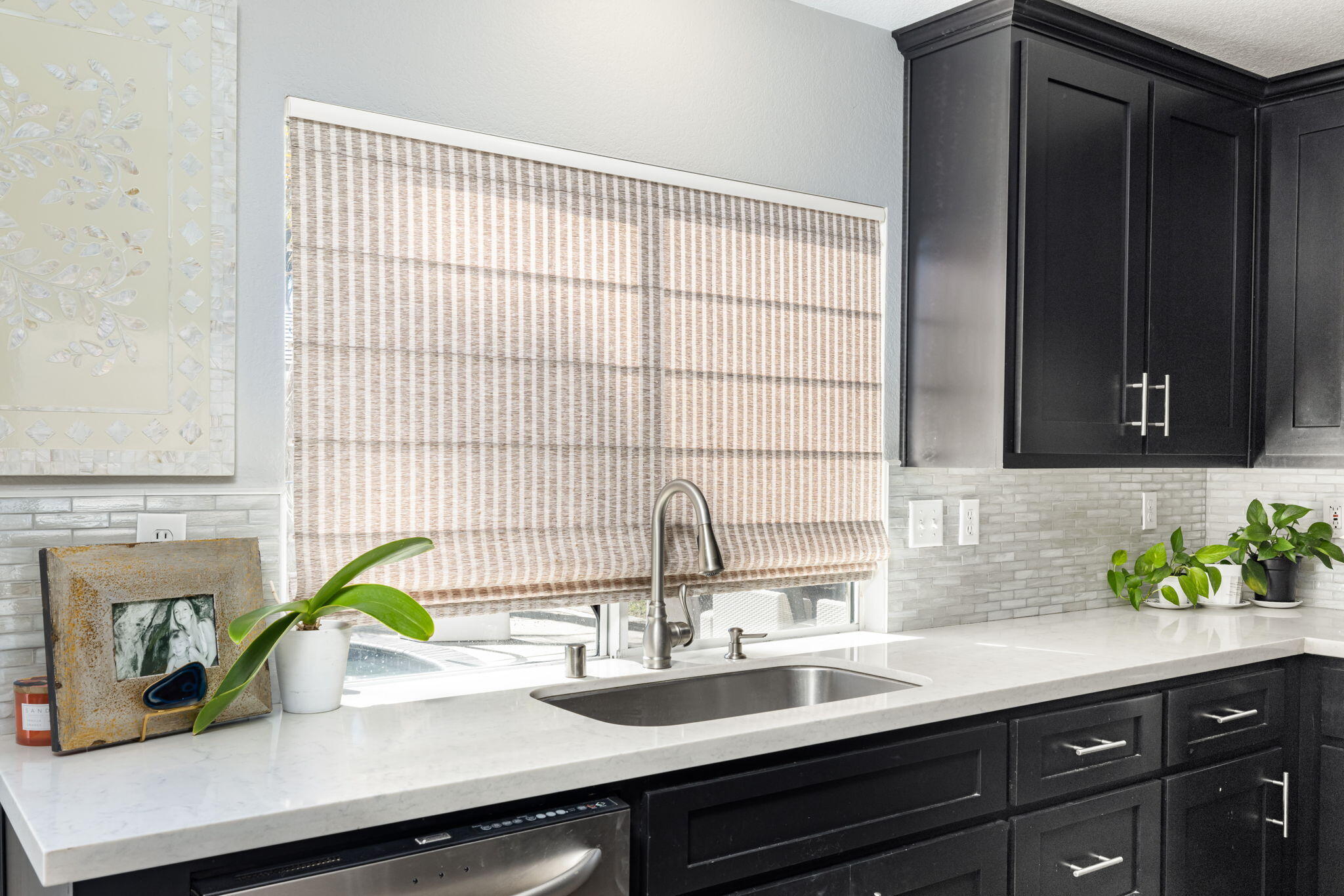 7607 Canberra Way Riverside, CA 92508 - Photo 15 of 28 a close view of sink and mirror