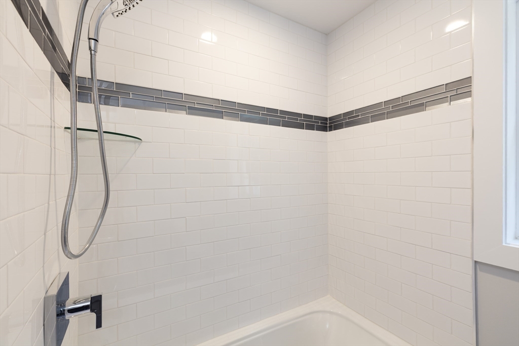 239 Hardy Pond Road Waltham, MA 02451 - Photo 18 of 28 a bathroom with a shower