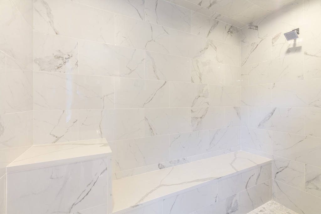 239 Hardy Pond Road Waltham, MA 02451 - Photo 23 of 28 a bathroom with a bathtub