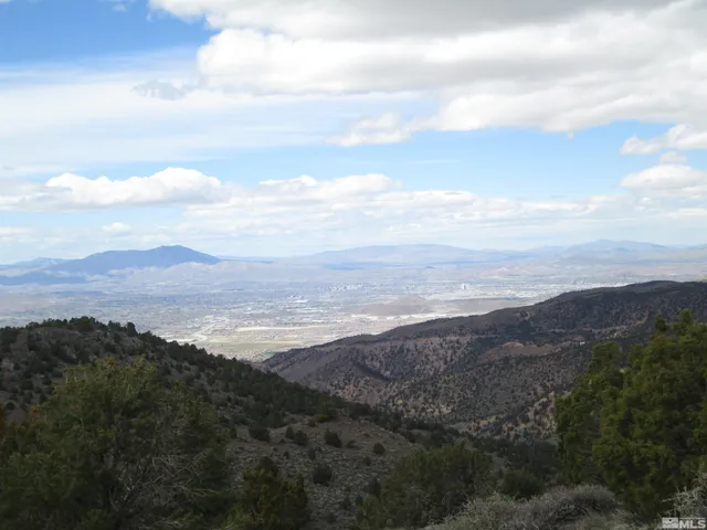 a view of an ocean and mountain