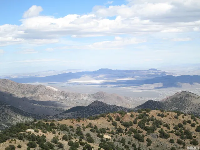a view of mountain with lake