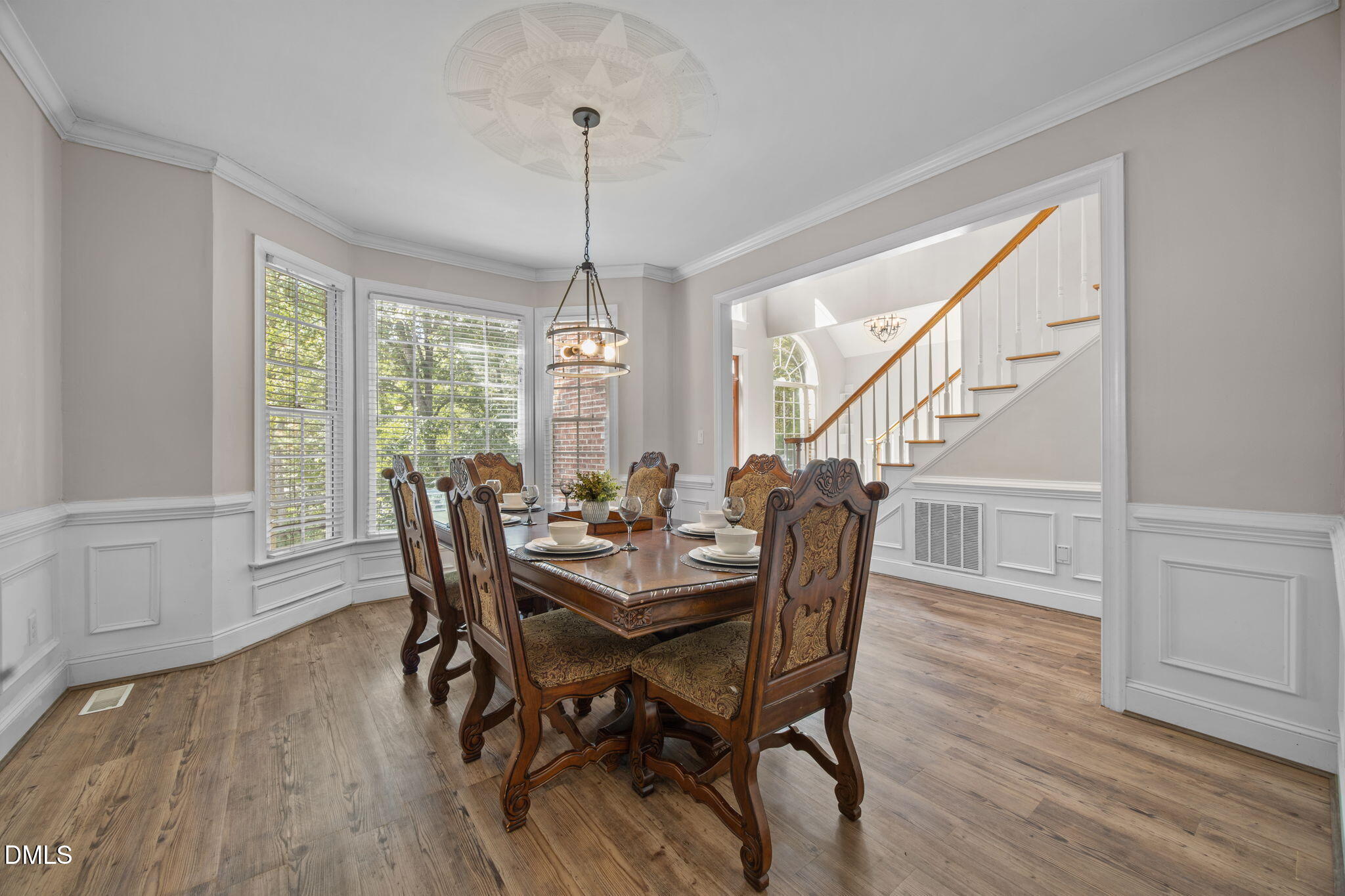 3689 Graham Sherron Road Wake Forest, NC 27587 - Photo 19 of 57 a view of a dining room with furniture window and wooden floor