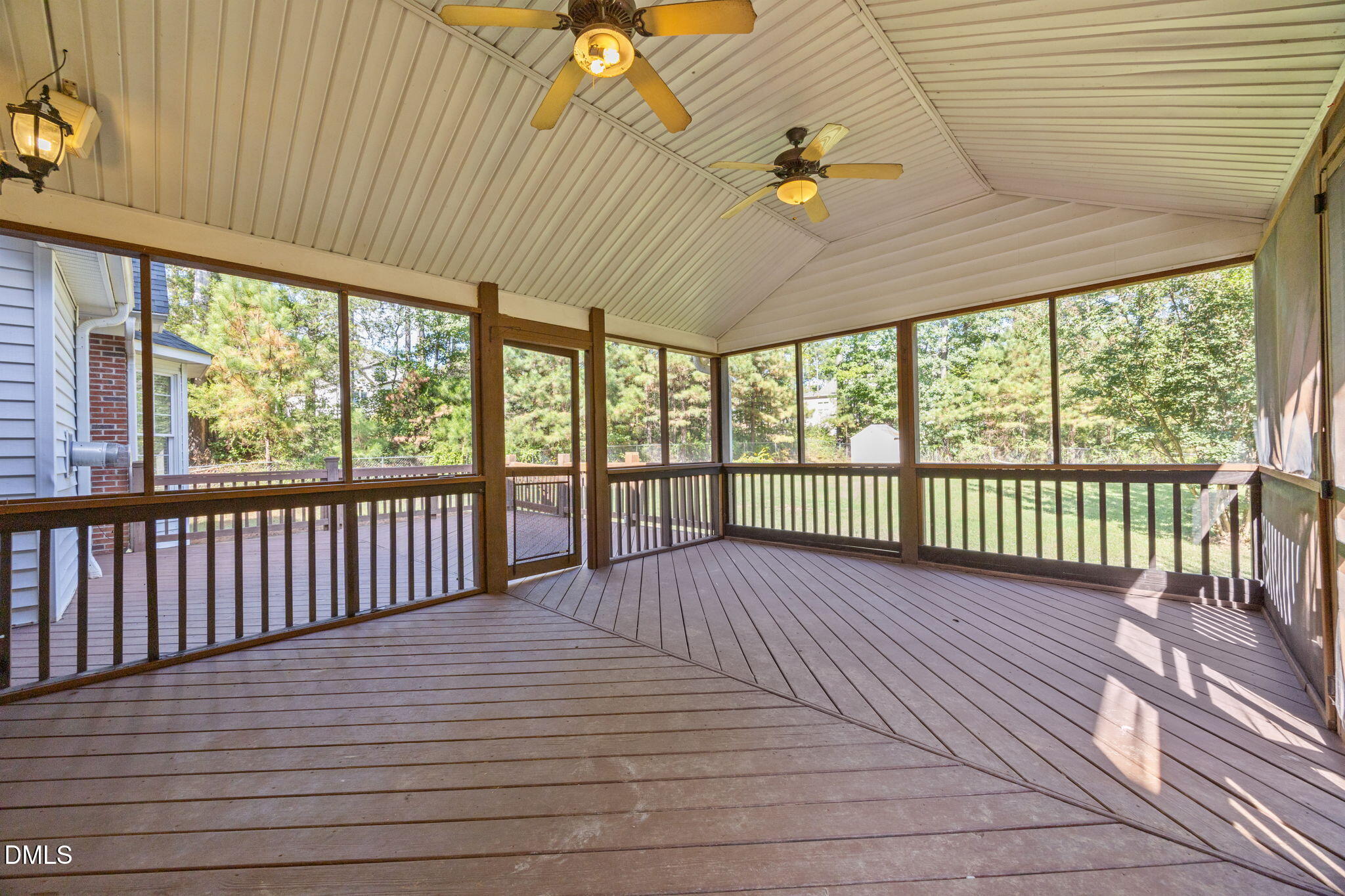 3689 Graham Sherron Road Wake Forest, NC 27587 - Photo 43 of 57 a view of a porch with wooden floor in front of a house
