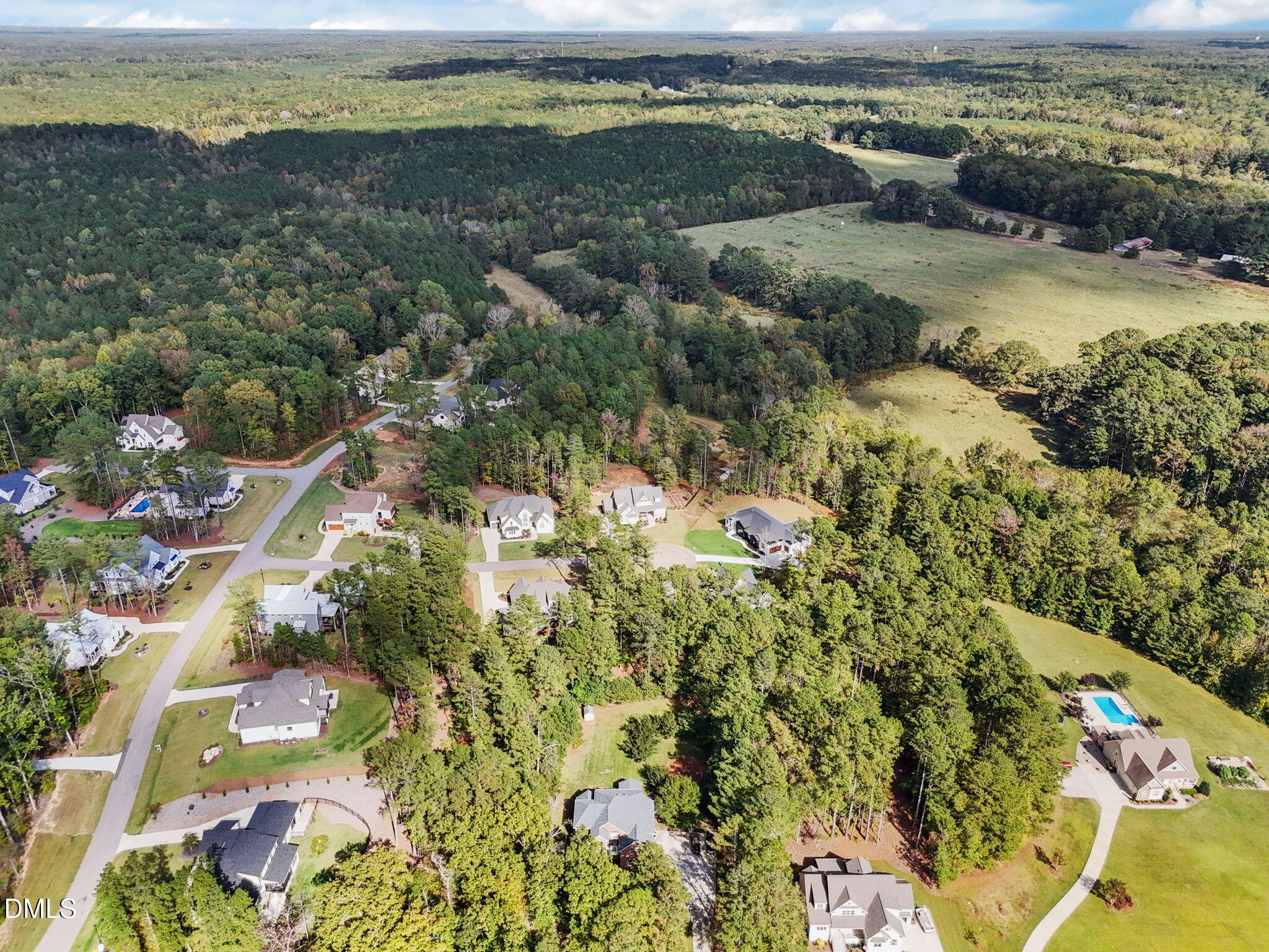 3689 Graham Sherron Road Wake Forest, NC 27587 - Photo 56 of 57 an aerial view of residential houses with outdoor space
