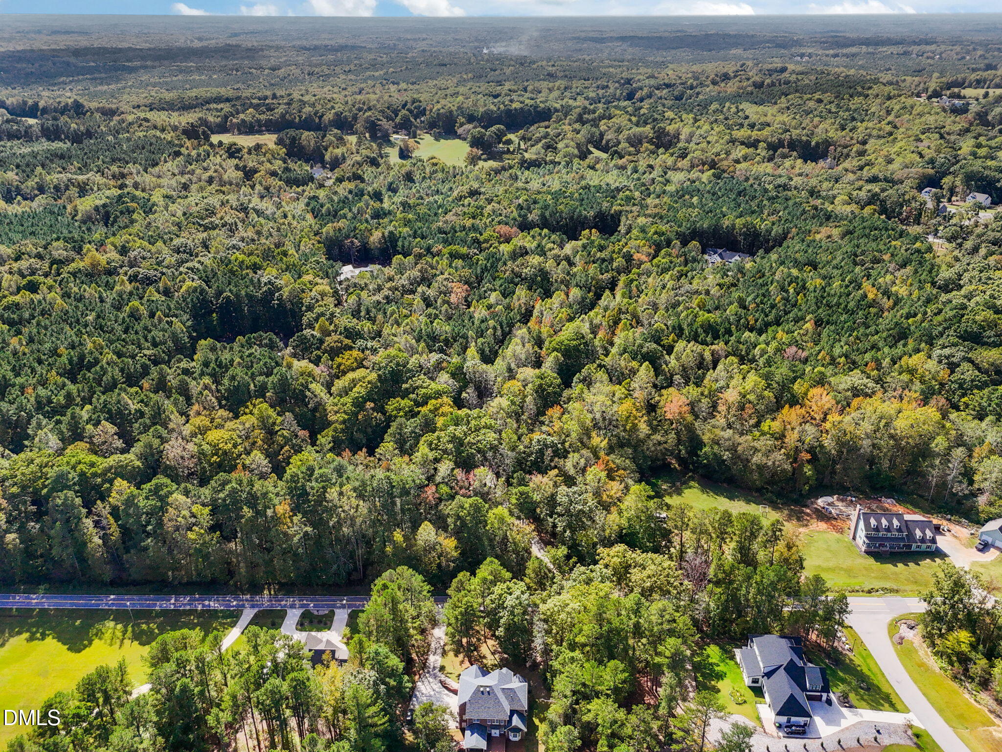 3689 Graham Sherron Road Wake Forest, NC 27587 - Photo 57 of 57 an aerial view of a houses with a yard