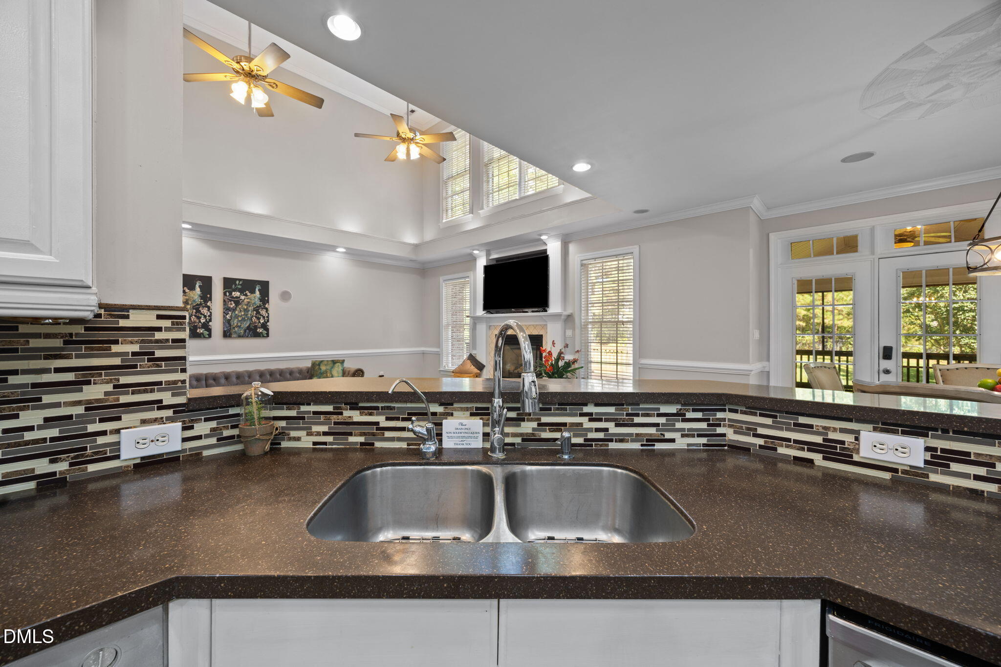 3689 Graham Sherron Road Wake Forest, NC 27587 - Photo 9 of 57 a kitchen with a sink and a stove top oven