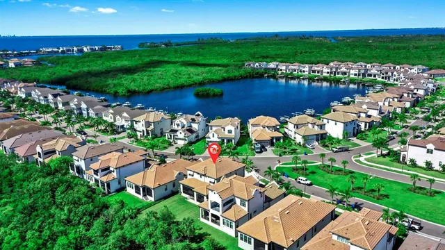 an aerial view of a houses with outdoor space and street view