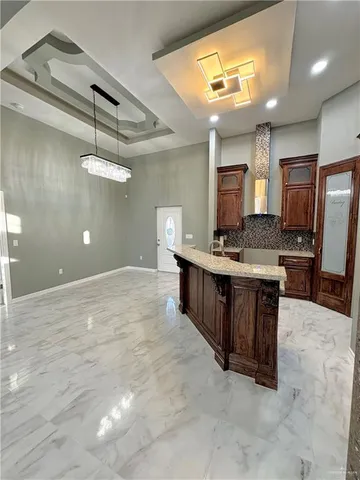 a bathroom with a sink a vanity and a mirror