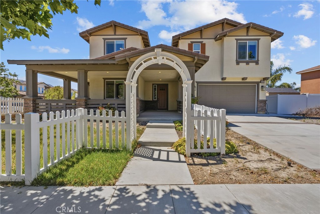 232 River Street Fillmore, CA 93015 - Photo 1 of 61 a front view of a house with glass windows and a yard