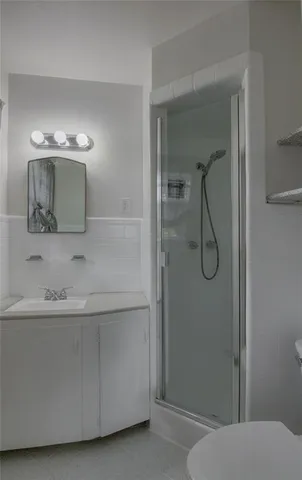 a bathroom with a sink and mirror