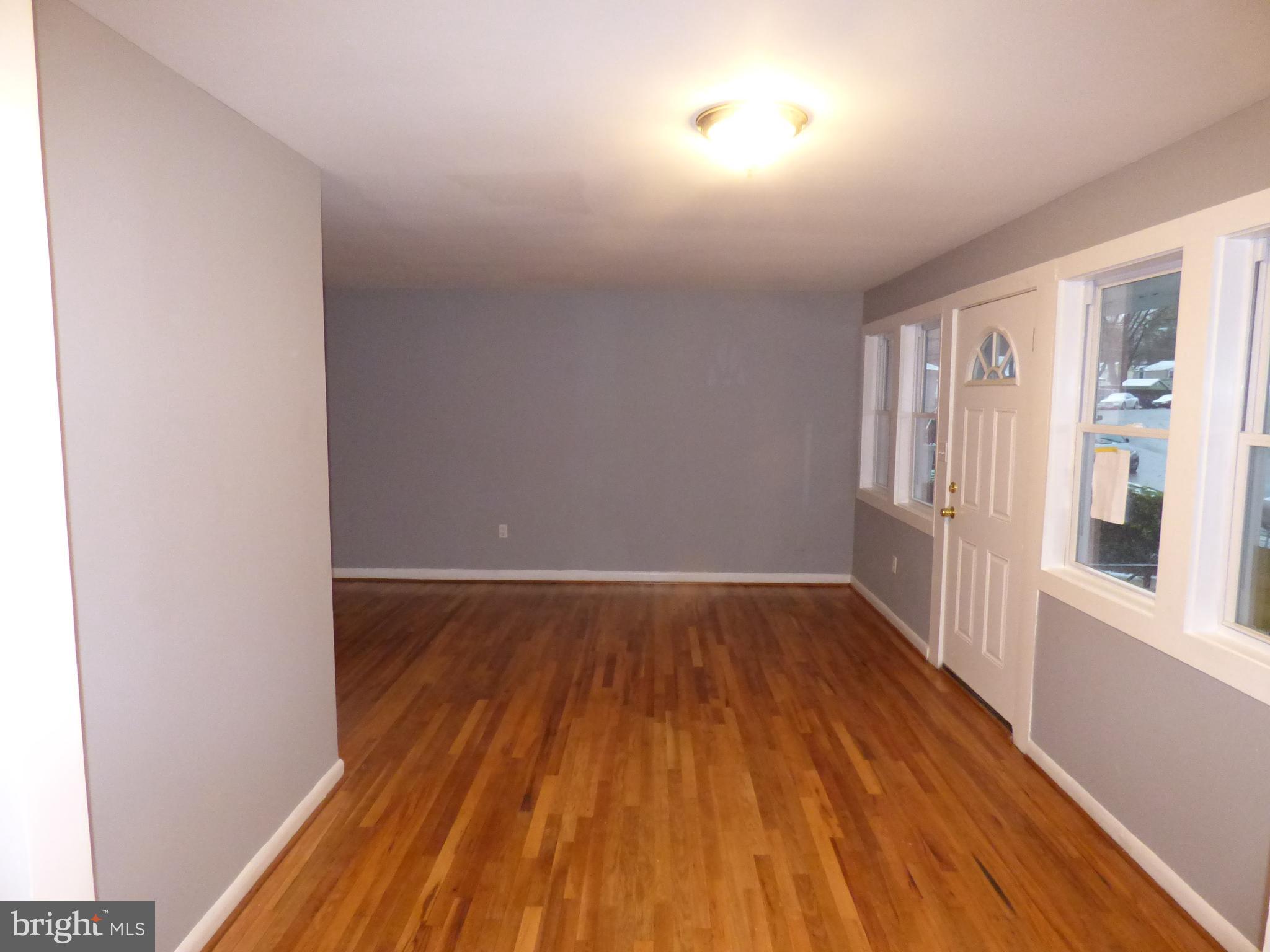 7829 Burnside Road Landover, MD 20785 - Photo 21 of 38 Dining Room Living Room