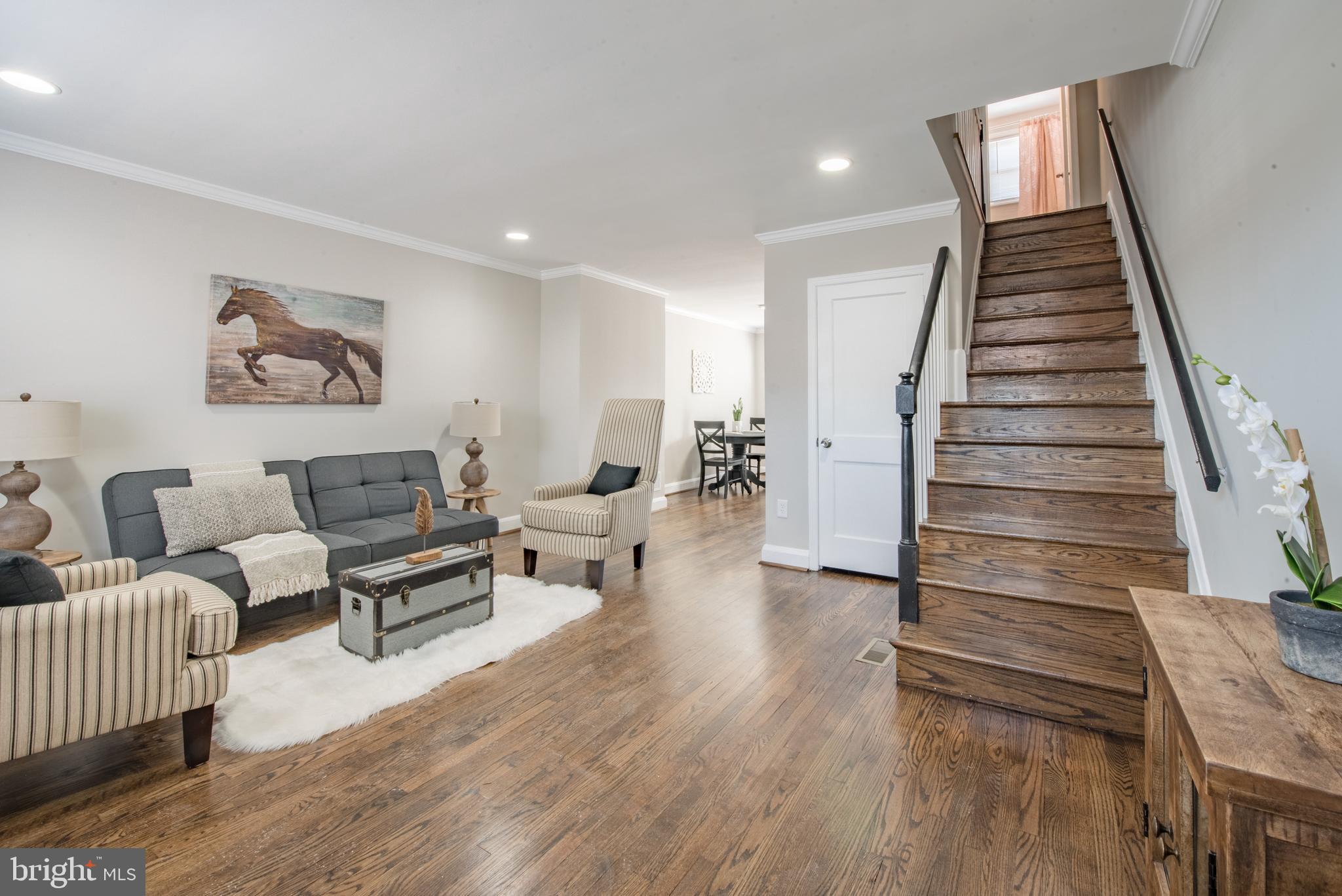 408 Grovethorn Road Baltimore, MD 21220 - Photo 6 of 33 Living Room / Staircase