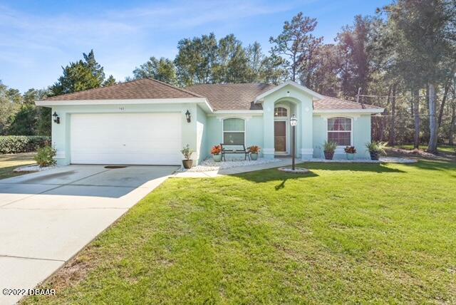 945 Cassadaga Road Lake Helen, FL 32744 - Photo 1 of 11 Front