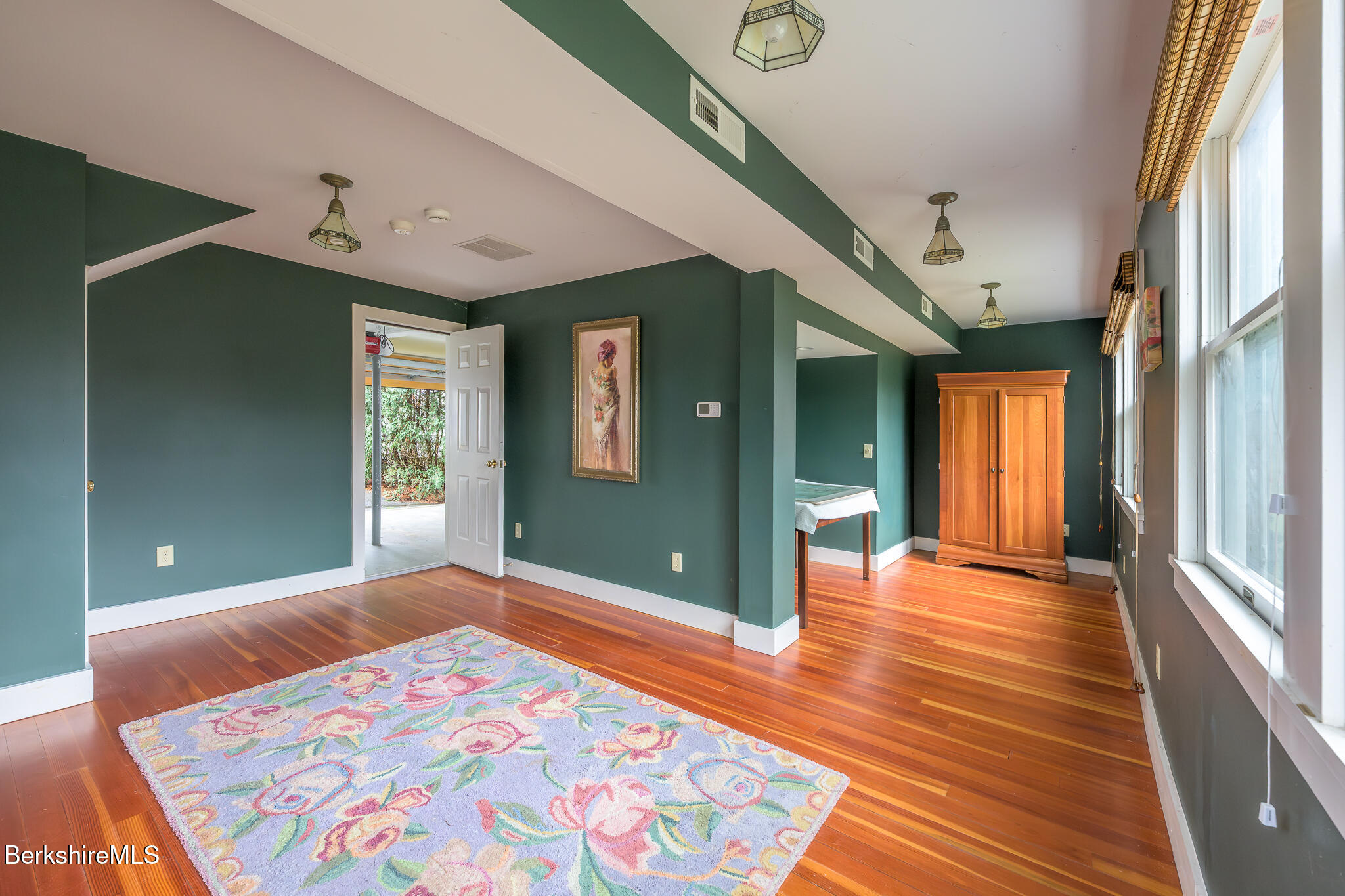 11 Sergeant Street Stockbridge, MA 01262 - Photo 42 of 52 a view of a hallway with wooden floor and windows
