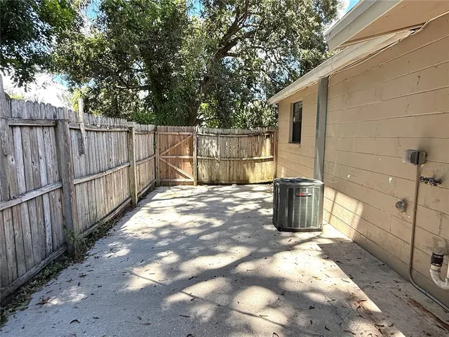 a view of backyard with green space