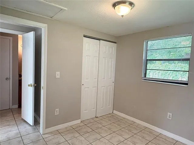 a bathroom with a sink a toilet and bathtub