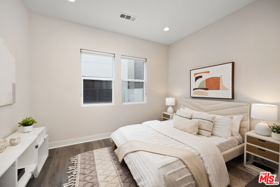 386 Novel Irvine, CA 92618 - Photo 14 of 52 a bedroom with a bed and a window