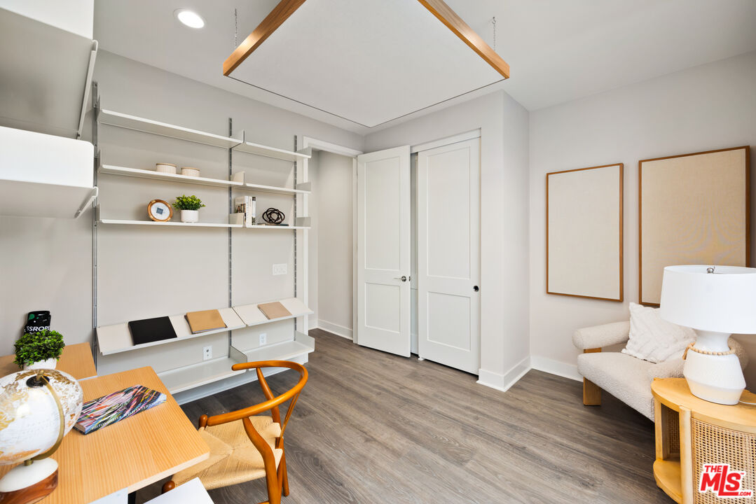 386 Novel Irvine, CA 92618 - Photo 18 of 52 a workspace with furniture and wooden floor