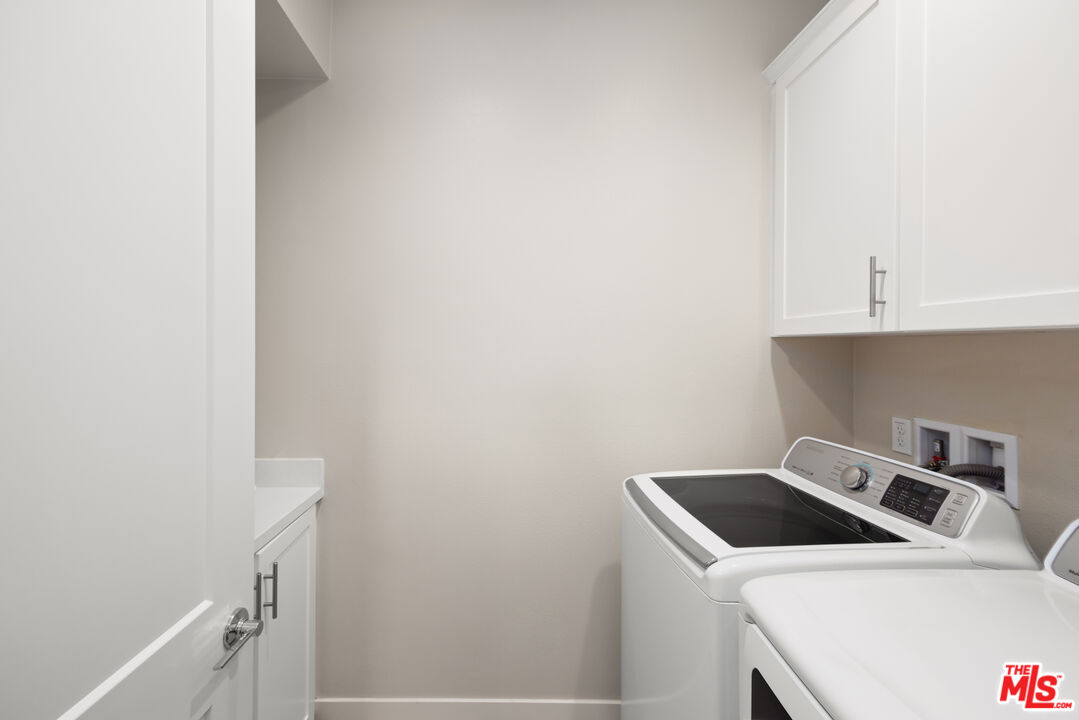 386 Novel Irvine, CA 92618 - Photo 21 of 52 a utility room with dryer and washer