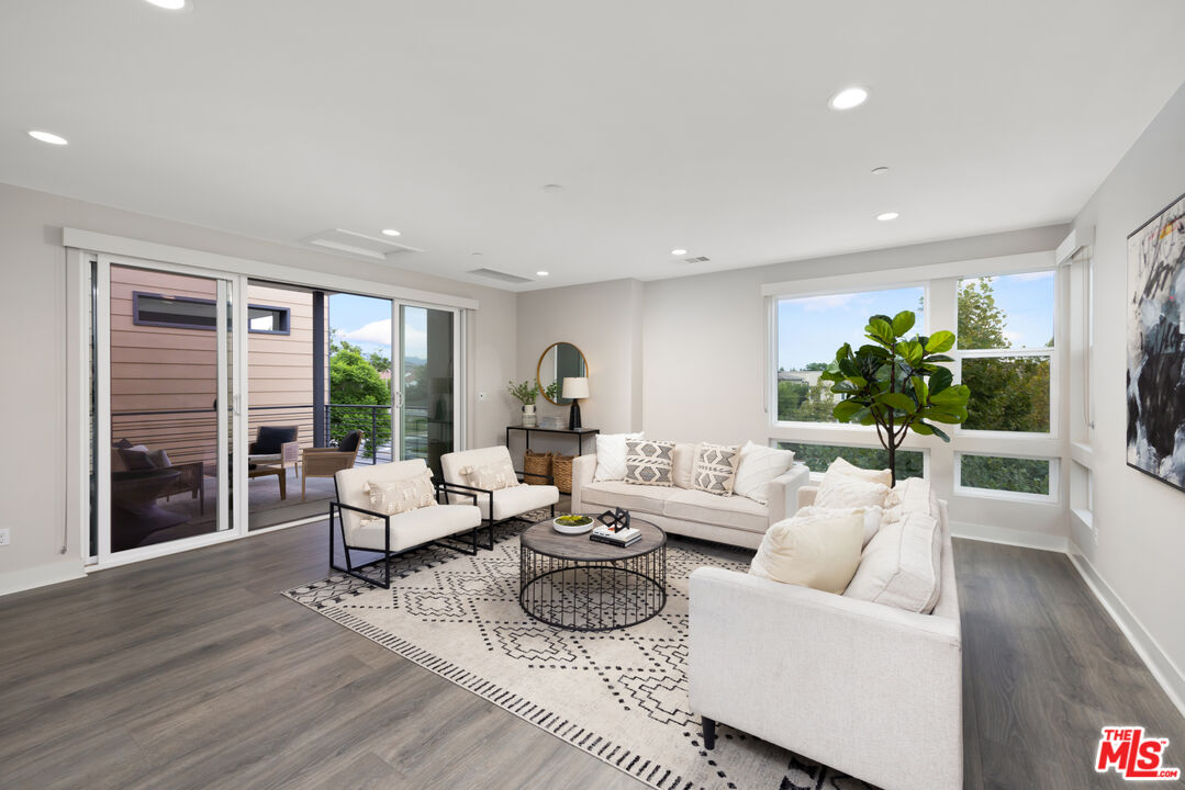 386 Novel Irvine, CA 92618 - Photo 29 of 52 a living room with furniture and a large window
