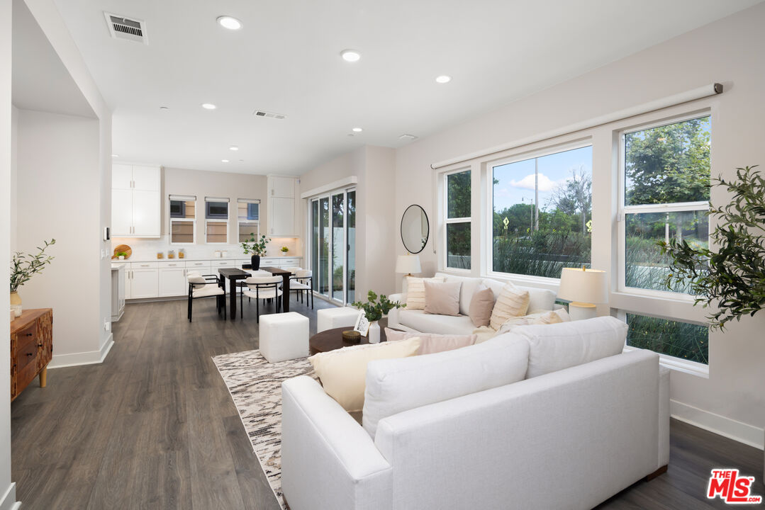 386 Novel Irvine, CA 92618 - Photo 3 of 52 a living room with furniture and a large window