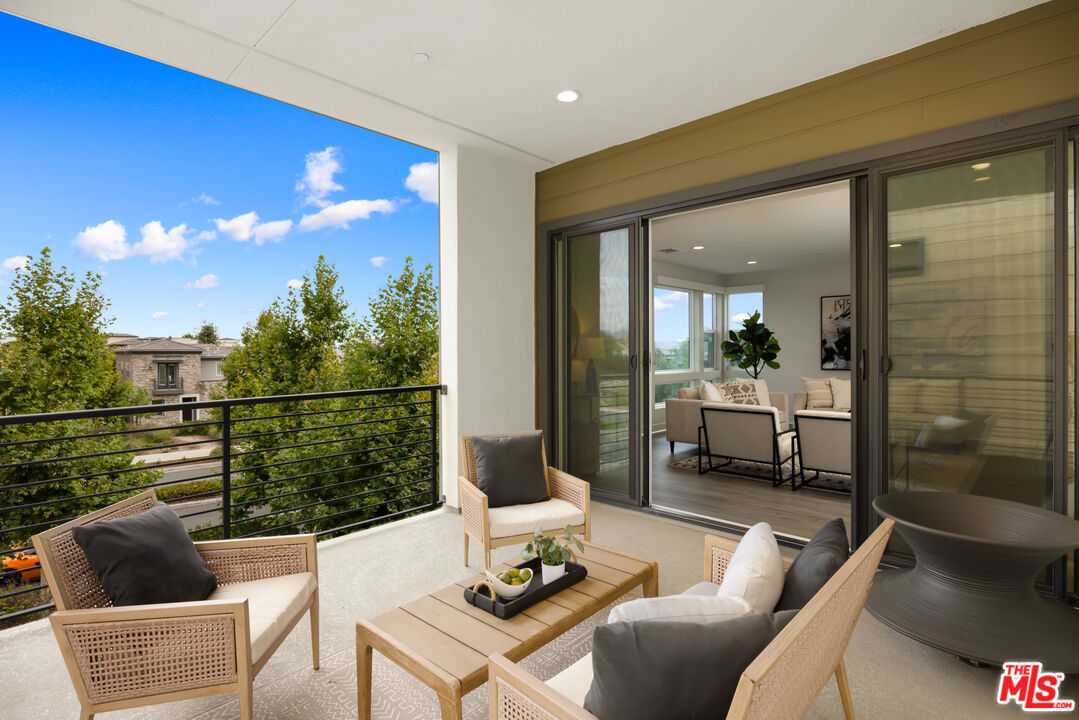 386 Novel Irvine, CA 92618 - Photo 32 of 52 a living room with furniture and a potted plant