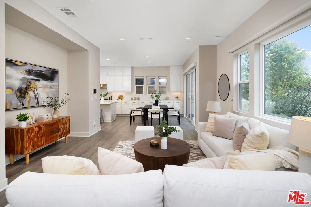 386 Novel Irvine, CA 92618 - Photo 4 of 52 a living room with furniture and a large window