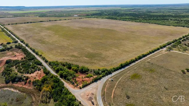 an aerial view of beach and ocean
