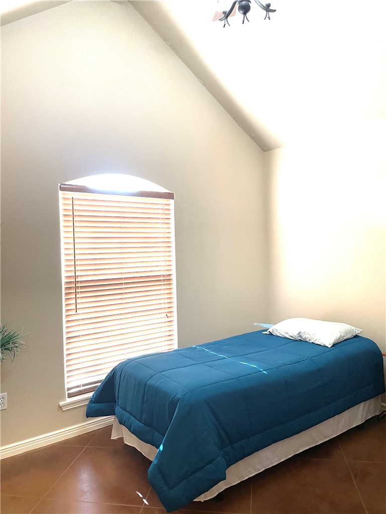 5937 Hidden Valley Loop Sandia, TX 78383 - Photo 20 of 28 Guest Room with Cathedral Ceilings