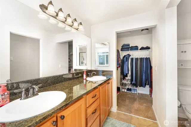 a bathroom with a sink double vanity