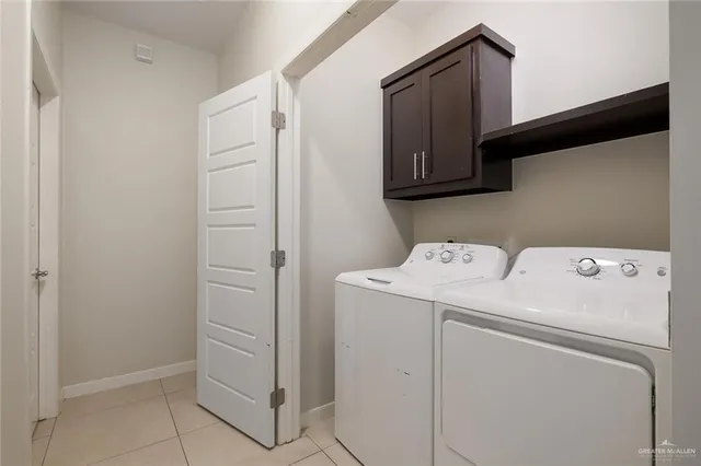 a bathroom with a granite countertop sink toilet and mirror