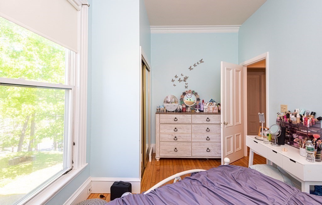 30 Chestnut Street Stoneham, MA 02180 - Photo 20 of 41 a bedroom with a bed and a window