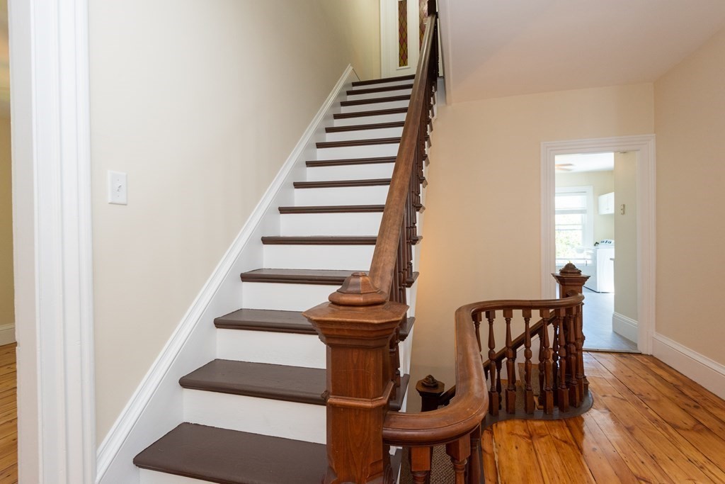 30 Chestnut Street Stoneham, MA 02180 - Photo 39 of 41 a view of entryway and hall with wooden floor