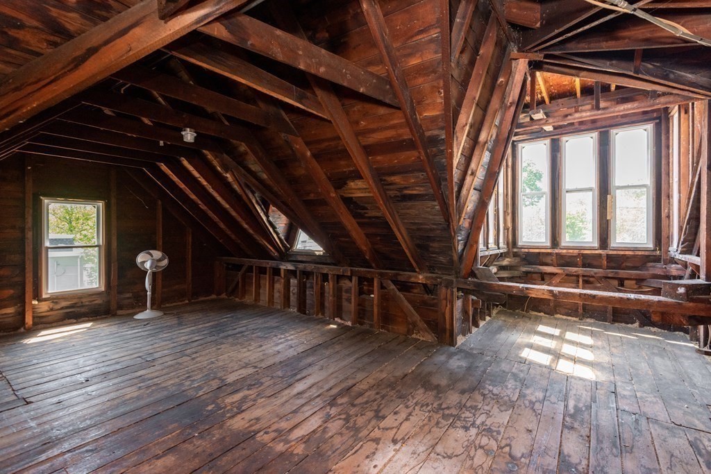 30 Chestnut Street Stoneham, MA 02180 - Photo 41 of 41 a view of an empty room with wooden floor and windows