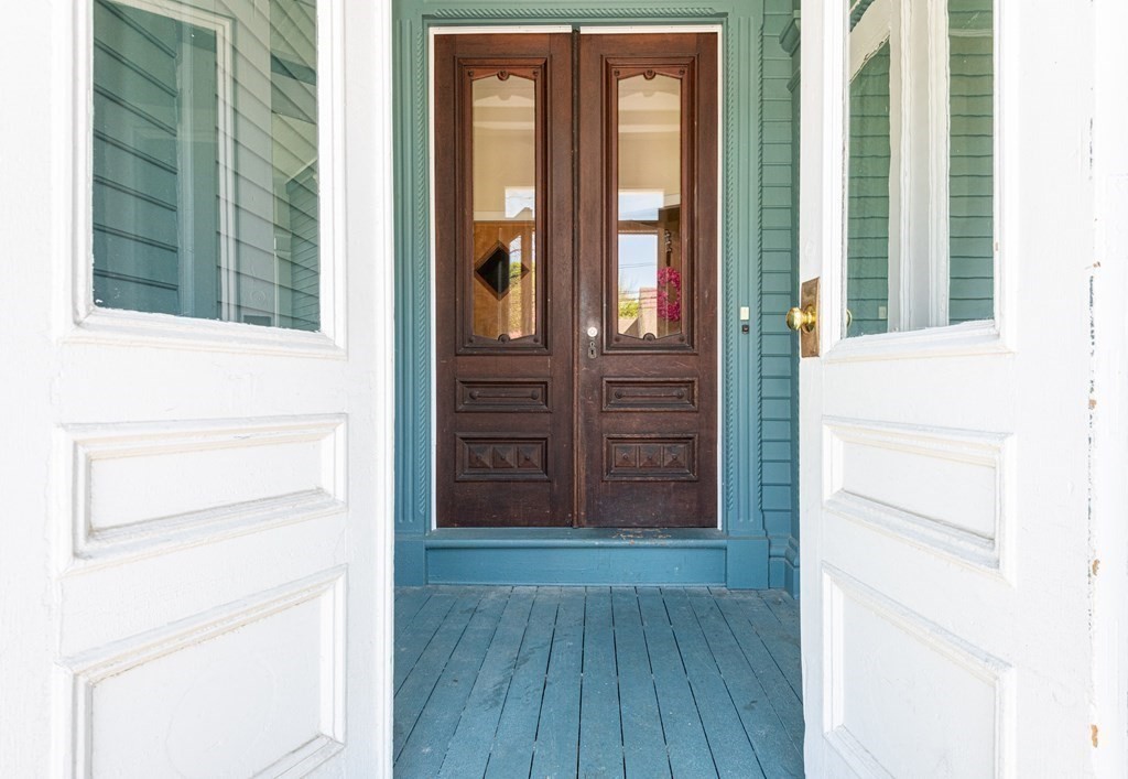 30 Chestnut Street Stoneham, MA 02180 - Photo 7 of 41 a view of front door with hallway