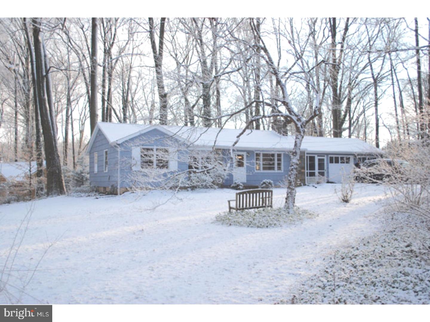 591 Farnum Road Media, PA 19063 - Photo 1 of 21 a front view of a house with a garden and trees