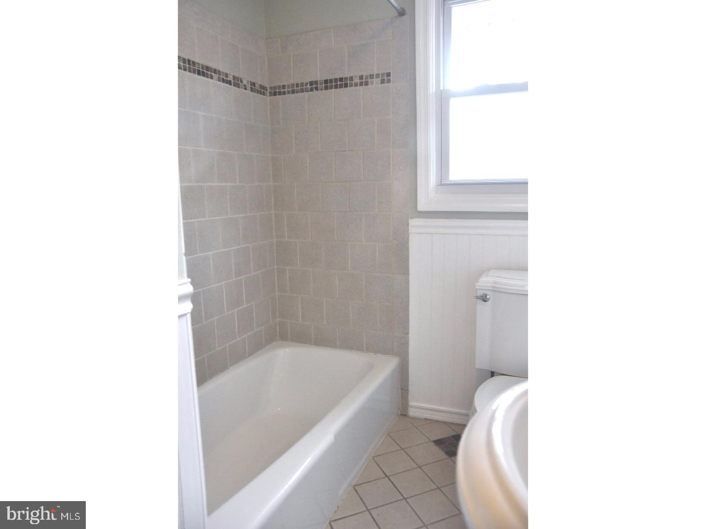 591 Farnum Road Media, PA 19063 - Photo 18 of 21 a bathroom with a tub and shower