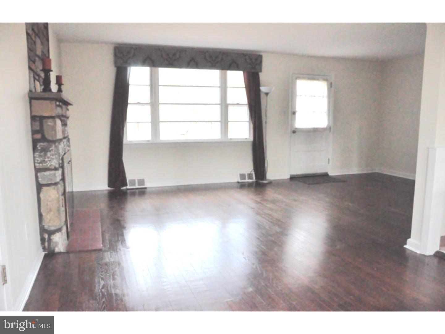 591 Farnum Road Media, PA 19063 - Photo 5 of 21 a view of empty room with wooden floor and fan