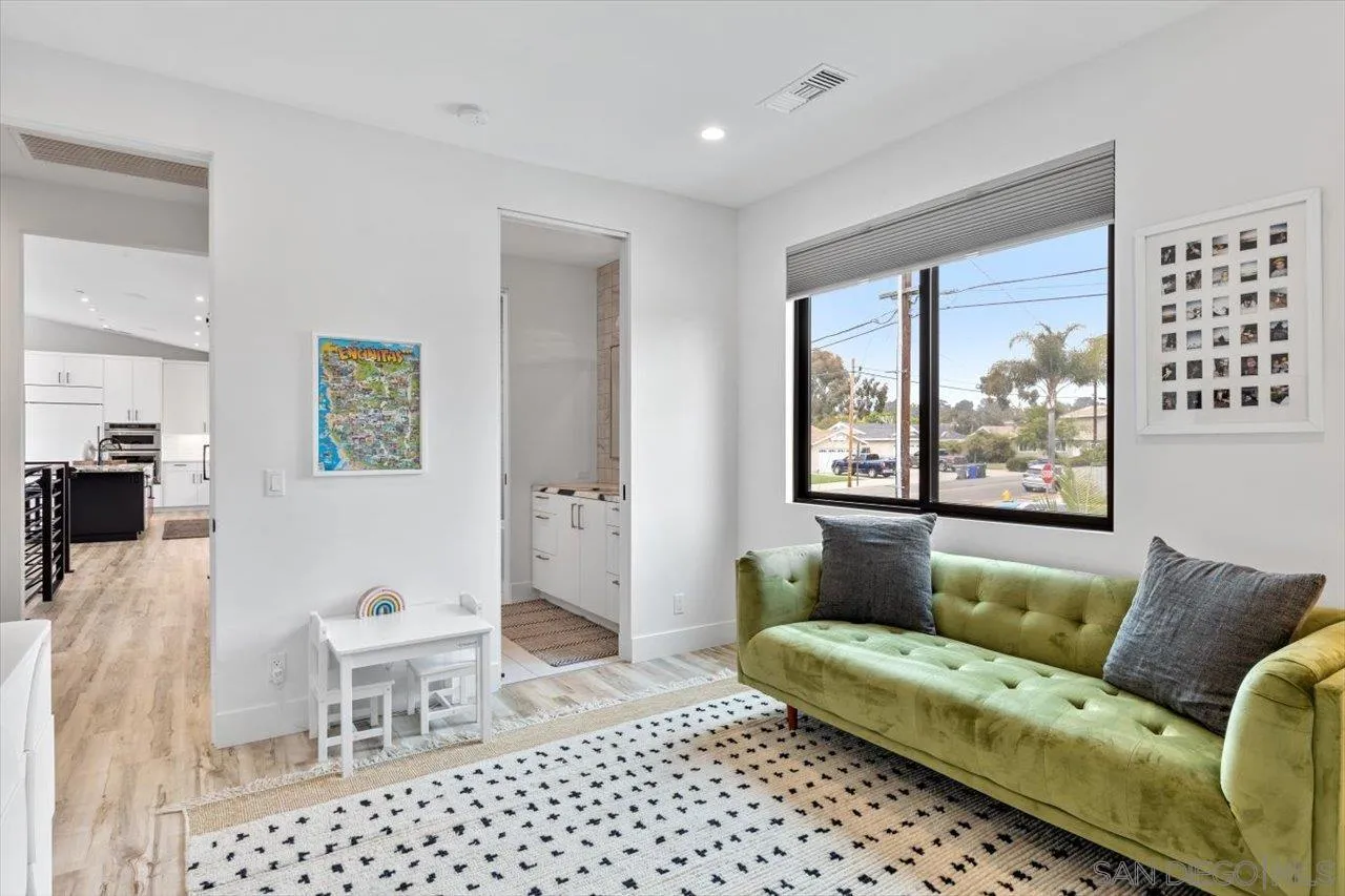 1604 Legaye Drive Encinitas, CA 92007 - Photo 17 of 43 a living room with furniture and a large window