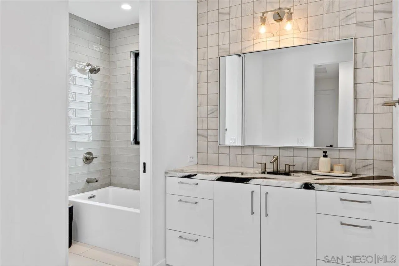 1604 Legaye Drive Encinitas, CA 92007 - Photo 18 of 43 a bathroom with a sink and a bathtub