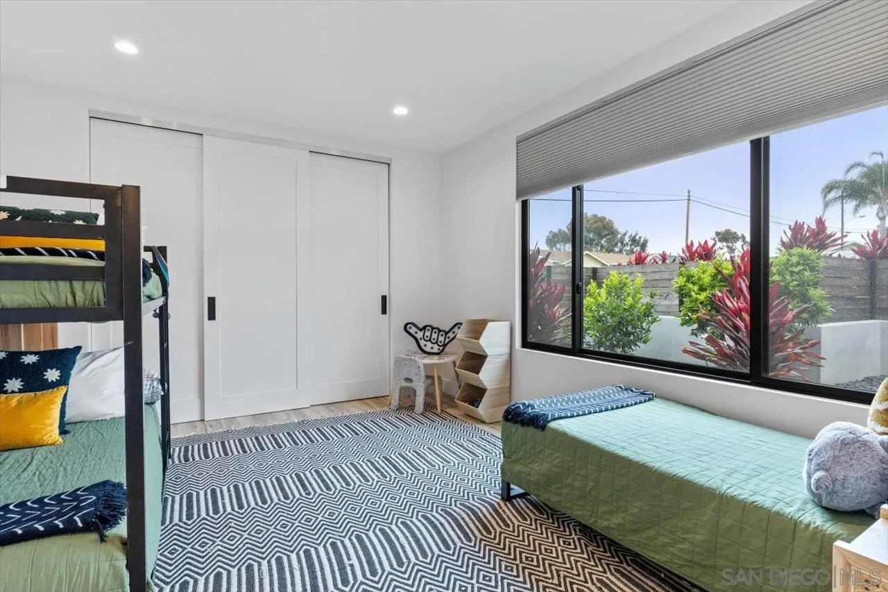 1604 Legaye Drive Encinitas, CA 92007 - Photo 32 of 43 a bedroom with furniture and a window