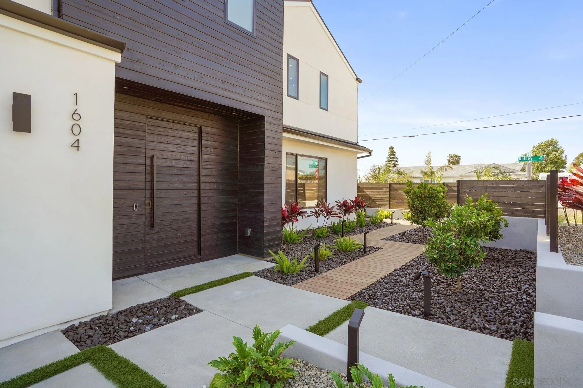 1604 Legaye Drive Encinitas, CA 92007 - Photo 42 of 43 a front view of a house with garden