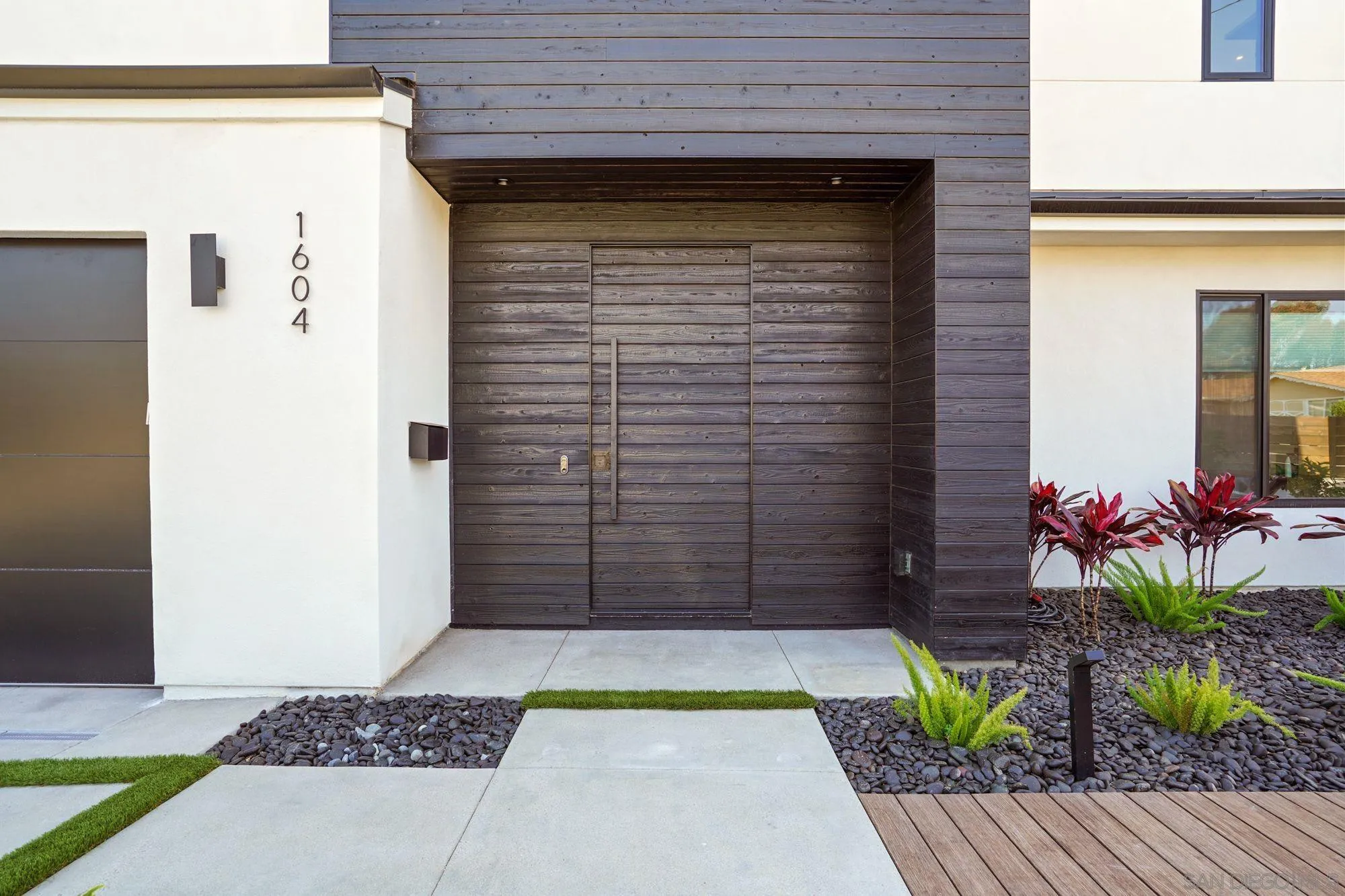 1604 Legaye Drive Encinitas, CA 92007 - Photo 43 of 43 a front view of a house with a garden