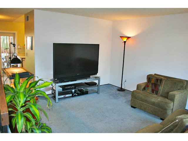 292 Perch Way Seacliff, CA 95003 - Photo 3 of 13 a living room with furniture and a flat screen tv