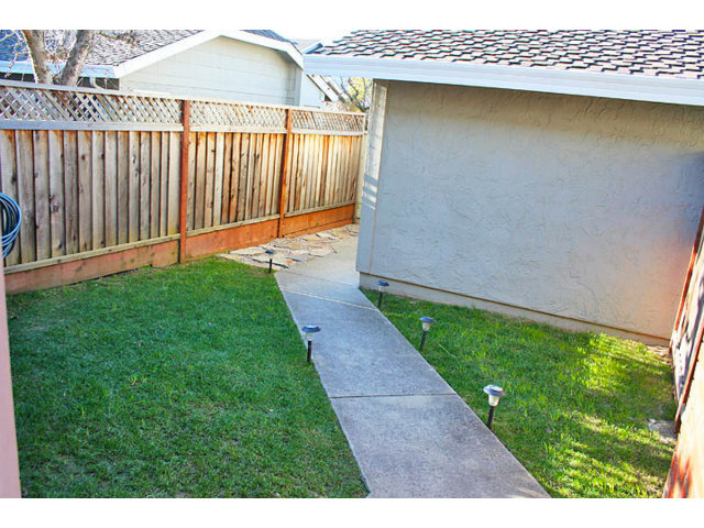 292 Perch Way Seacliff, CA 95003 - Photo 9 of 13 a view of a backyard with a garden